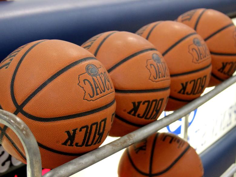 Five Basketballs on a rack ready to be used by student athletes 